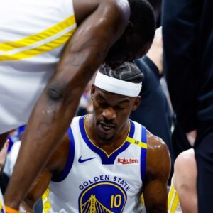Golden State Warriors forward Jimmy Butler III (10) draws on a board with forward Draymond Green (23) during the second quarter against the Sacramento Kings at Golden 1 Center.