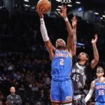 Oklahoma City Thunder guard Shai Gilgeous-Alexander (2) drives past Brooklyn Nets guard Keon Johnson (45) in the second quarter at Barclays Center