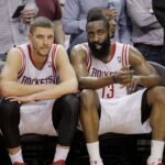 Houston Rockets small forward Chandler Parsons (25) and shooting guard James Harden (13) sit on the bench during the fourth quarter against the Portland Trail Blazers at Toyota Center.