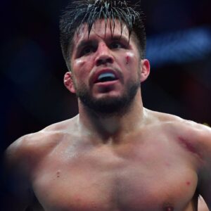 Henry Cejudo reacts during UFC 298 at Honda Center.