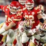 Kansas City Chiefs quarterback Patrick Mahomes breaks off a run after escaping from San Francisco 49ers defensive tackle DeForest Buckner and defensive end Dee Ford during the fourth quarter of Super Bowl LIV at Hard Rock Stadium in Miami Gardens, on Feb. 2, 2020.