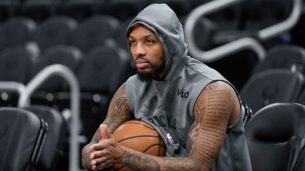 Milwaukee Bucks guard Damian Lillard (0) looks on during warmups prior to the game against the Orlando Magic at Fiserv Forum Mandatory Credit: Jeff Hanisch-Imagn Images