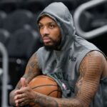 Milwaukee Bucks guard Damian Lillard (0) looks on during warmups prior to the game against the Orlando Magic at Fiserv Forum Mandatory Credit: Jeff Hanisch-Imagn Images