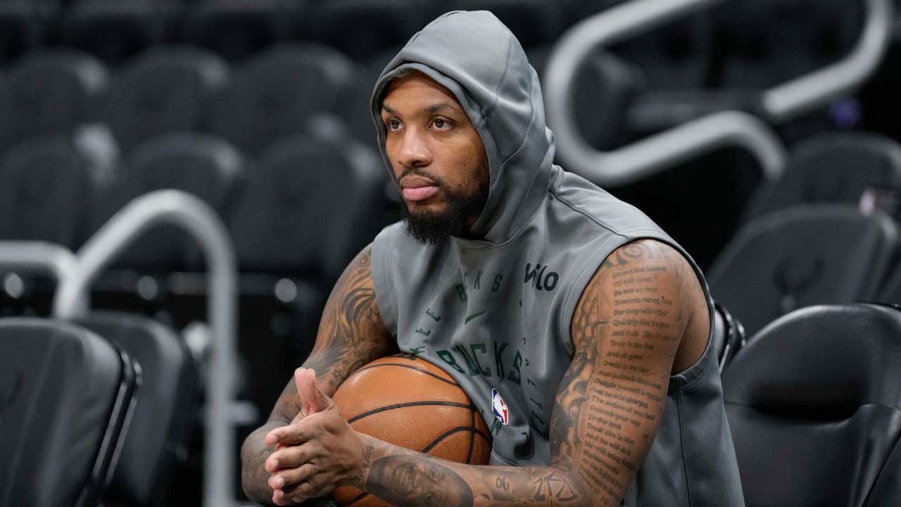 Milwaukee Bucks guard Damian Lillard (0) looks on during warmups prior to the game against the Orlando Magic at Fiserv Forum Mandatory Credit: Jeff Hanisch-Imagn Images