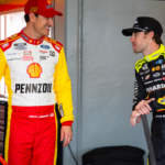 Feb 12, 2025; Daytona Beach, Florida, USA; NASCAR Cup Series driver Joey Logano (left) talks with teammate Ryan Blaney during practice for the Daytona 500 at Daytona International Speedway. Mandatory Credit: Mark J. Rebilas-Imagn Images