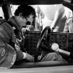Driver Richard Petty buckles in during qualifying trials for the Nashville Pepsi 420 NASCAR Grand National race at Nashville International Raceway on July 13, 1984. © Greg Lovett / The Tennessean / USA TODAY NETWORK via Imagn Images