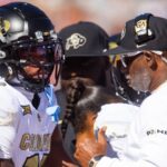 Oct 19, 2024; Tucson, Arizona, USA; Colorado Buffalos wide receiver Travis Hunter (12) with head coach Deion Sanders against the Arizona Wildcats at Arizona Stadium.