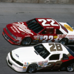 1987 Feb 12: Bobby Allison (22) Buick races Davey Allison (28) Ford Thunderbird in the 7-11 Twin 125s NASCAR Motorsport USA Winston Cup Series at Daytona International Speedway in Daytona Beach FL NASCAR Motorsport USA 1987 FEB 12 - 7-11 Twin 125s Icon9510212870222 EDITORIAL USE ONLY