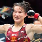 Zhang Weili (L) of China celebrates after the women s strawweight championship at the UFC 312 in Sydney, Australia, Feb. 9, 2025.