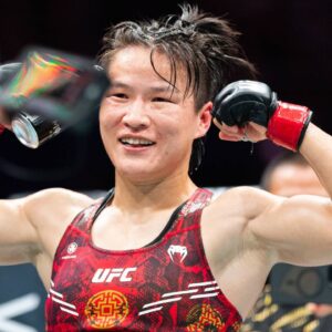 Zhang Weili (L) of China celebrates after the women s strawweight championship at the UFC 312 in Sydney, Australia, Feb. 9, 2025.