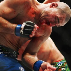 UFC 312 SYDNEY, Sean Strickland of United States ducks from a punch from Dricus Du Plessis of South Africa in his middleweight title bout during the UFC 312 event at Qudos Bank Arena in Sydney, Sunday, February 9, 2025.