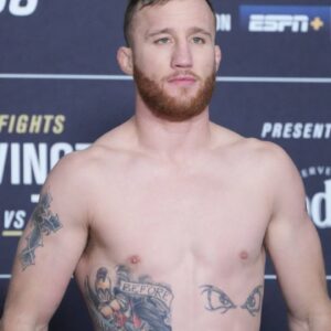 Justin Gaethje steps on the scale for the official weigh-ins at Hilton Midtown for UFC268 - Usman vs Covington 2