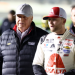 Feb 14, 2024; Daytona Beach, Florida, USA; NASCAR Cup Series driver William Byron (24) and Rick Hendrick (left) walk on pit row during qualifying for the Daytona 500 at Daytona International Speedway. Mandatory Credit: Mark J. Rebilas-Imagn Images