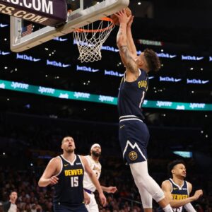 Denver Nuggets forward Michael Porter Jr. (1) rebounds a ball during the third quarter against the Los Angeles Lakers at Crypto.com Arena.