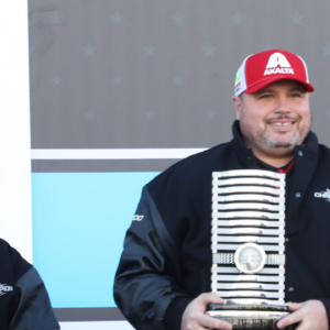 Rudy Fugle, crew chief for Hendrick Motorsports' No. 24 team, poses with his trophy in Victory Lane, Monday, Feb. 17, 2025.