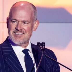 Master of Ceremonies Rich Eisen of the NFL Network speaks at the 2024 Pro Football Hall of Fame Enshrinees’ gold jacket dinner at Canton Memorial Civic Center.