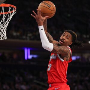 Memphis Grizzlies guard Ja Morant (12) rebounds during the second half against the New York Knicks at Madison Square Garden.