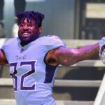 Tennessee Titans tight end Delanie Walker (82) takes the stage during the Titans uniform reveal event held at Broadway and 1st Avenue.