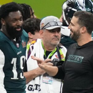 Philadelphia Eagles head coach Nick Sirianni reacts with linebacker Josh Sweat (19) during the fourth quarter against the Kansas City Chiefs in Super Bowl LIX at Caesars Superdome.