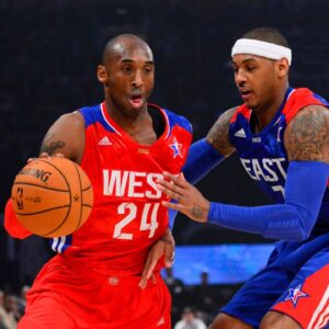 Western Conference guard Kobe Bryant (24) of the Los Angeles Lakers drives against Eastern Conference forward Carmelo Anthony (7) of the New York Knicks in the first quarter of the 2013 NBA all star game at the Toyota Center