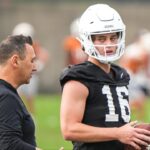 Texas head coach Steve Sarkisian talks to quarterback Arch Manning (16) during the first Texas Longhorns football practice of 2023 at the Frank Denius Fields on the University of Texas at Austin campus on Monday, March 6, 2023. Aem Texfoot First 2023 Practice 7