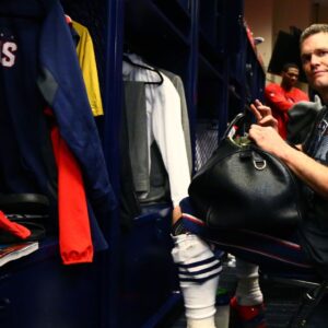 New England Patriots quarterback Tom Brady reacts in the locker room as he looks for his jersey after defeating the Atlanta Falcons during Super Bowl LI at NRG Stadium.