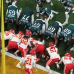 Feb 9, 2025; New Orleans, LA, USA; Philadelphia Eagles quarterback Jalen Hurts (1) prepares to snap the ball in the first quarter against the Kansas City Chiefs during Super Bowl LIX at Caesars Superdome.