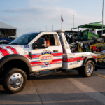 NASCAR Cup Series driver Christopher Bell’s car is towed away after a collision during the Ally 400 at Nashville Superspeedway in Lebanon, Tenn., Sunday, June 30, 2024.