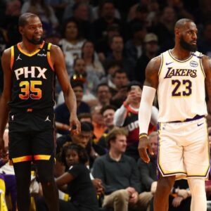 Los Angeles Lakers forward LeBron James (23) against Phoenix Suns forward Kevin Durant (35) during an NBA Cup game at Footprint Center