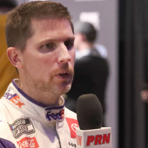 Denny Hamlin talks with Performance Racing Network Wednesday, February 14, 2024 during Daytona 500 Media Day at Daytona International Speedway.