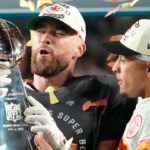 Super Bowl 57: Kansas City Chiefs quarterback Patrick Mahomes passes the the Lombardi Trophy to Travis Kelce after winning the Super Bowl against the Philadelphia Eagles at State Farm Stadium on Feb 12, 2023