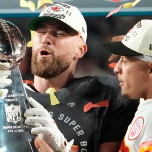 Super Bowl 57: Kansas City Chiefs quarterback Patrick Mahomes passes the the Lombardi Trophy to Travis Kelce after winning the Super Bowl against the Philadelphia Eagles at State Farm Stadium on Feb 12, 2023