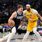 Dallas Mavericks guard Luka Doncic (77) and Los Angeles Lakers forward Anthony Davis (3) in action during the game between the Dallas Mavericks and the Los Angeles Lakers at the American Airlines Center