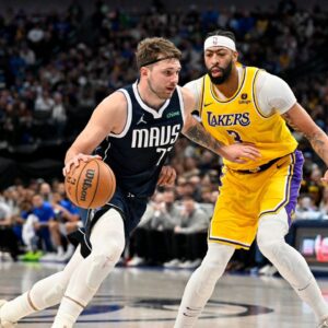 Dallas Mavericks guard Luka Doncic (77) and Los Angeles Lakers forward Anthony Davis (3) in action during the game between the Dallas Mavericks and the Los Angeles Lakers at the American Airlines Center