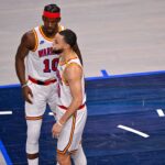 Golden State Warriors forward Jimmy Butler (10) and guard Stephen Curry (30) during the game between the Dallas Mavericks and the Golden State Warriors at the American Airlines Center.