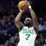 Boston Celtics guard Jaylen Brown (7) shoots the ball against the Philadelphia 76ers during the second quarter at Wells Fargo Center.