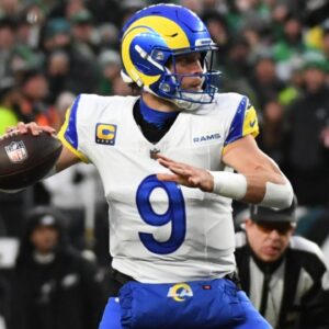 Jan 19, 2025; Philadelphia, Pennsylvania, USA; Los Angeles Rams quarterback Matthew Stafford (9) throws the ball against the Philadelphia Eagles during the first half in a 2025 NFC divisional round game at Lincoln Financial Field.