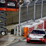 Feb 1, 2025; WInston-Salem, North Carolina, USA; NASCAR Cup Series driver Denny Hamlin (11) during the heat races for the Clash at Bowman Gray at Bowman Gray Stadium. Mandatory Credit: Peter Casey-Imagn Images
