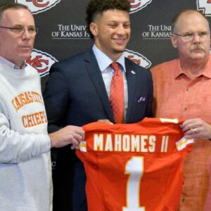 Kansas City Chiefs number 10 pick Patrick Mahomes II (middle), general manager John Dorsey (left) and head coach Andy Reid (right) pose for a photo during the press conference at Stram Theatre.