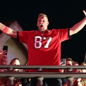 Oct 21, 2024; Tampa, Florida, USA; Former Tampa Bay Buccaneers tight end Rob Gronkowski (87) gets pumped up against the Baltimore Ravens during the first quarter at Raymond James Stadium.