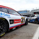 NASCAR Cup Series driver Josh Berry (21) and NASCAR Cup Series driver Brad Keselowski (6) during practice for the Daytona 500 at Daytona International Speedway.