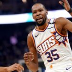 Phoenix Suns forward Kevin Durant (35) reacts after having his jersey pulled during action against the Golden State Warriors in the first quarter at the Chase Center.