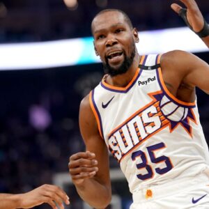 Phoenix Suns forward Kevin Durant (35) reacts after having his jersey pulled during action against the Golden State Warriors in the first quarter at the Chase Center.