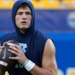 North Carolina Tar Heels quarterback Drake Maye (10) warms up before the game against the Pittsburgh Panthers at Acrisure Stadium.