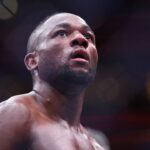 Dec 14, 2024; Tampa, Florida, UNITED STATES; Manel Kape (red gloves) reacts after defeating Bruno Silva (blue gloves) at Amalie Arena.