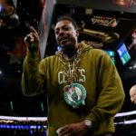 Boston Celtics former player Paul Pierce looks into a video camera on the court before game two of the 2024 NBA Finals between the Boston Celtics and the Dallas Mavericks at TD Garden.