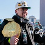 Feb 14, 2025; Philadelphia, PA, USA; Philadelphia Eagles cornerback Cooper DeJean (33) celebrates during the Super Bowl LIX championship parade and rally.
