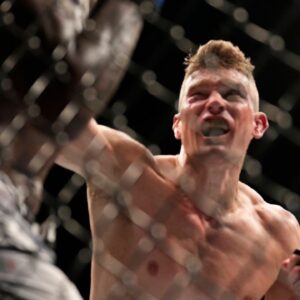 Stephen Thompson (L) and Kevin Holland (R) step in the octagon for a 5-round bout at Amway Center for UFC Orlando