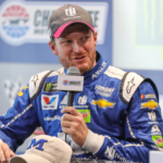 Monster Energy NASCAR Cup Series driver Dale Earnhardt Jr. (88) answers questions after practice for the Bank of American 500 at Charlotte Motor Speedway.