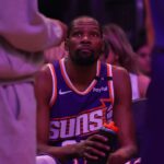 Phoenix Suns forward Kevin Durant (35) in a huddle during a timeout against the New Orleans Pelicans in the fourth quarter at Footprint Center